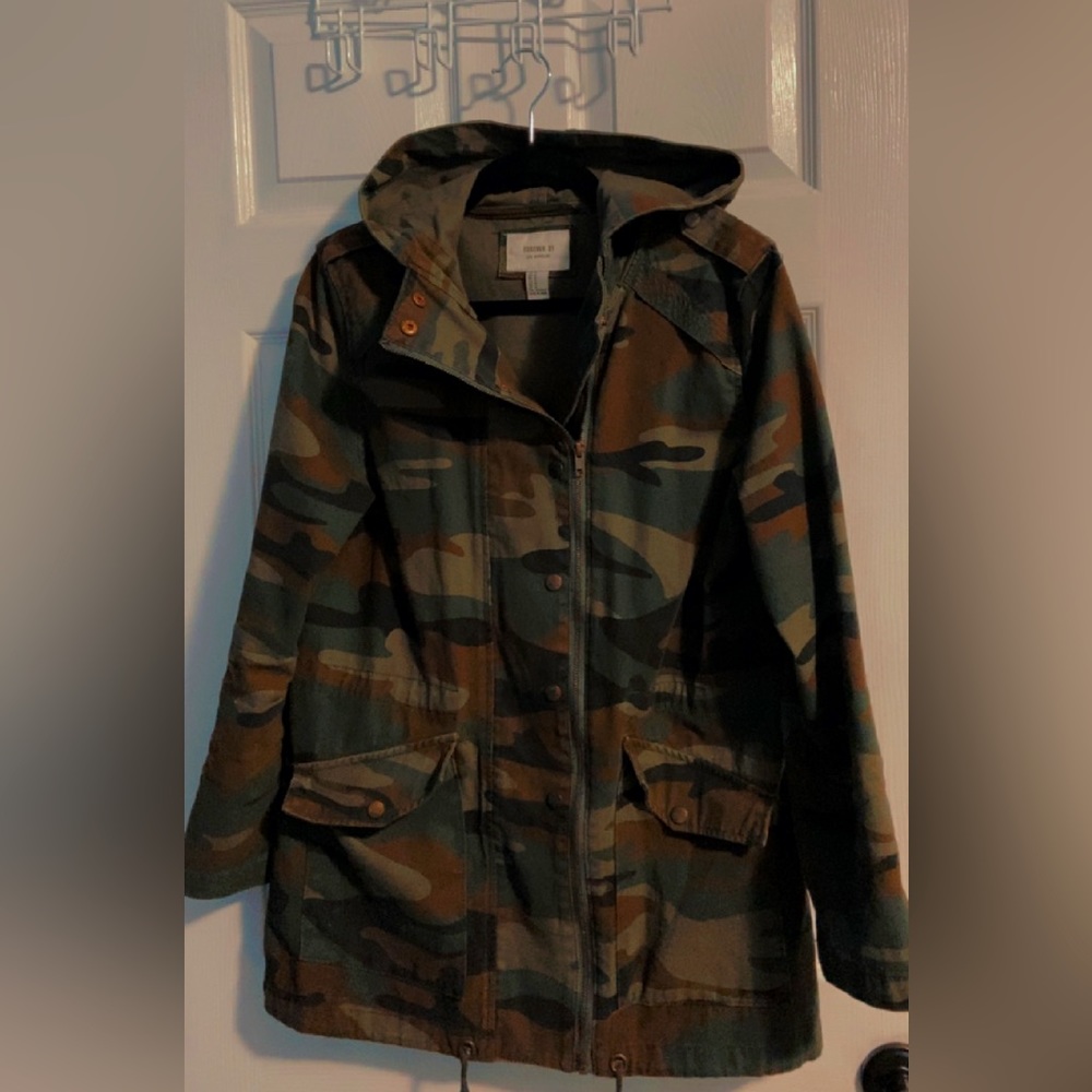 Camouflage jacket in that can be worn alone or layered with other clothing!